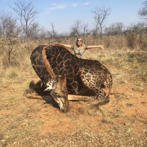 Tess Talley poses with 'rare' giraffe